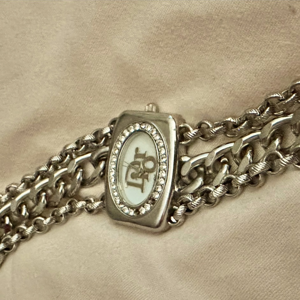 Silver Dior watch - 2 little stones missing. Like new